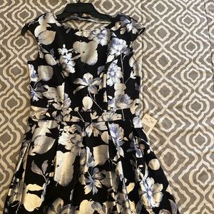 Brand new flowered waist fitting dress